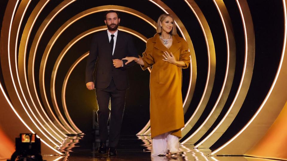 PHOTO: Rene-Charles Angelil escorts Celine Dion as she speaks onstage during the 66th GRAMMY Awards at Crypto.com Arena, Feb. 4, 2024, in Los Angeles. (Kevin Winter/Getty Images )