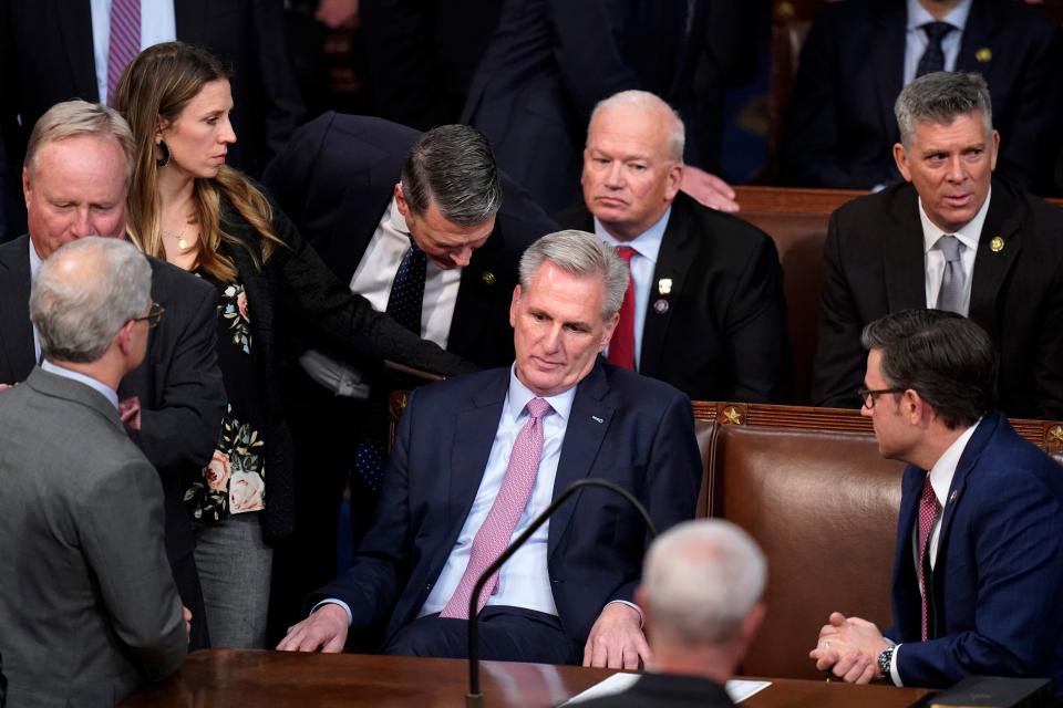 Rep. Kevin McCarthy, R-Calif., reacts after losing the 14th vote in the House chamber as the House meets for the fourth day to elect a speaker and convene the 118th Congress in Washington, Friday, Jan. 6, 2023.