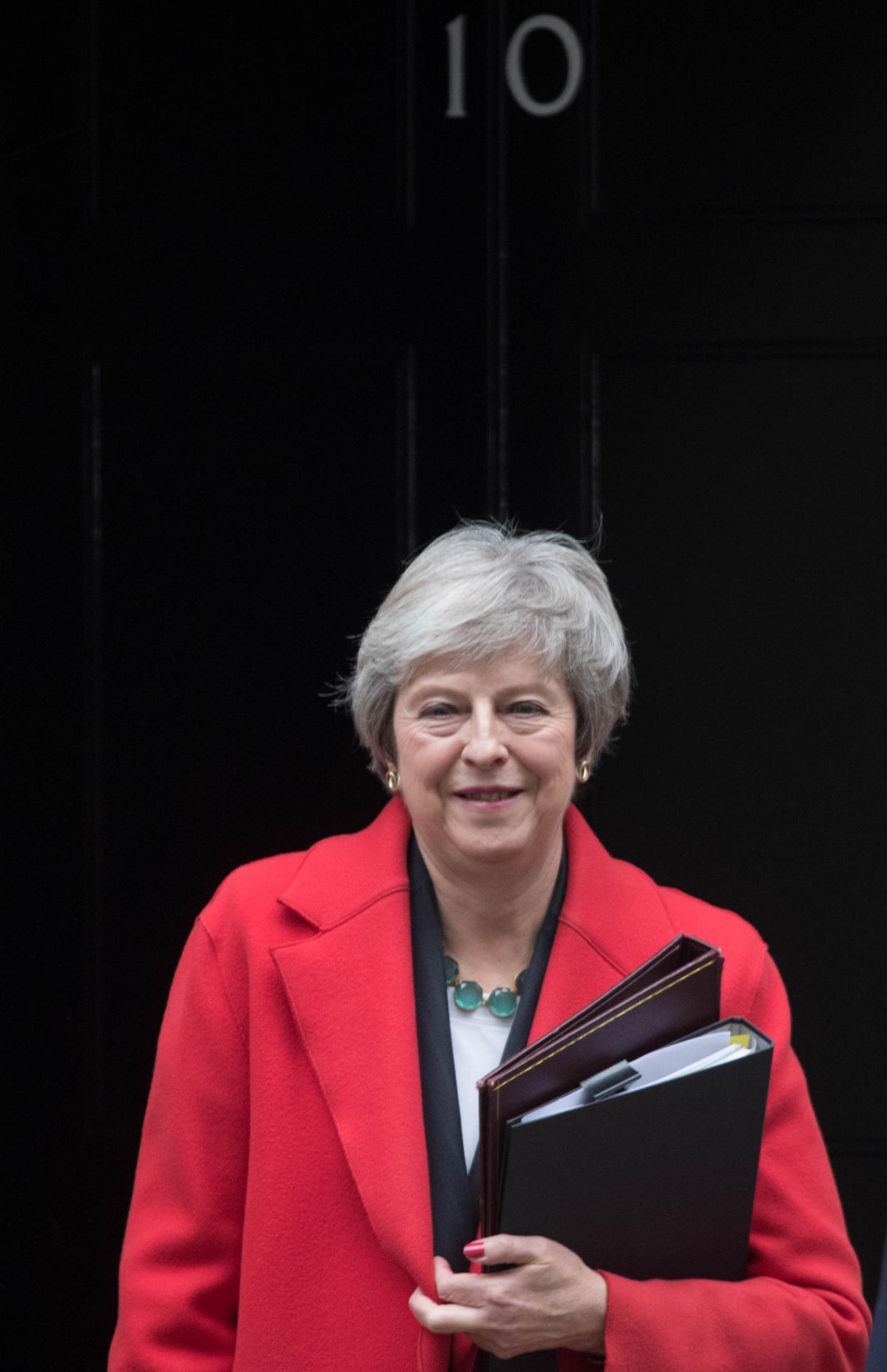 Prime Minister Theresa May leaves 10 Downing Street, London, for the House of Commons to make a statement on the draft Brexit withdrawal agreement.