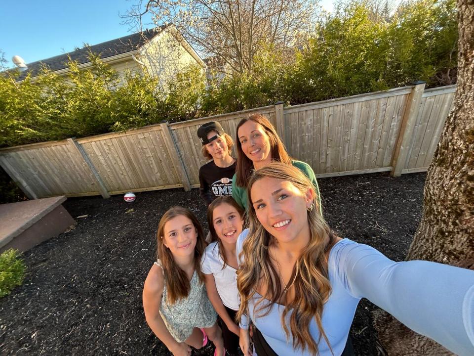 Susie MacDow (back right) said her daughter Jane MacDow (front right) studies in a portable classroom at Moncton High School. Her daughter Layla (in the middle), Jude (left) and son Baxter will be attending Moncton High School in future.