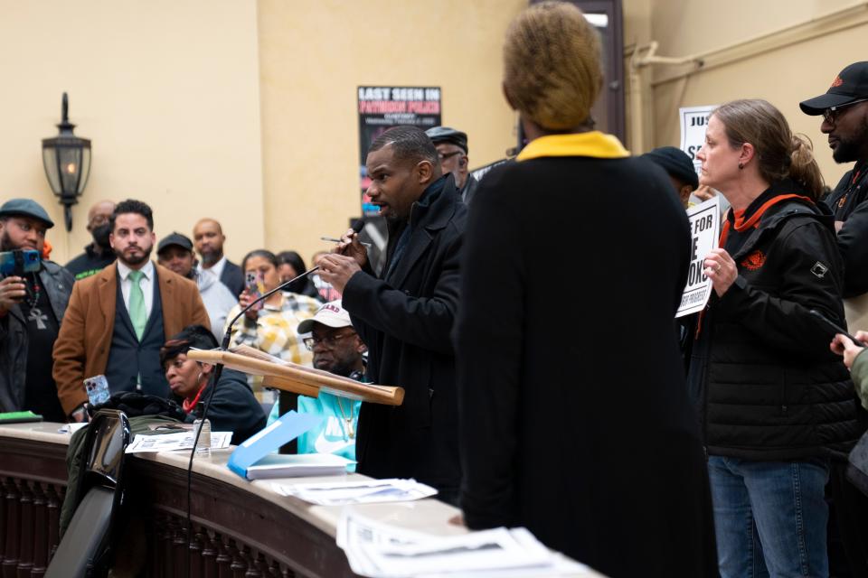 Casey Melvin, field operations director for the Paterson Healing Collective, speaks about Najee Seabrooks, a violence intervention specialist who worked with the Paterson Healing Collective, during a Paterson City Council meeting on Tuesday, March 14, 2023. Seabrooks was fatally shot by Paterson police after a standoff while he was barricaded inside his home.