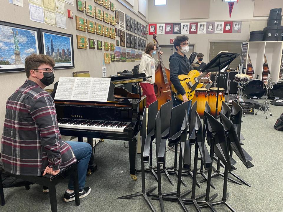 Members of the Foothill High School jazz band practice for Club Cougar on Monday.