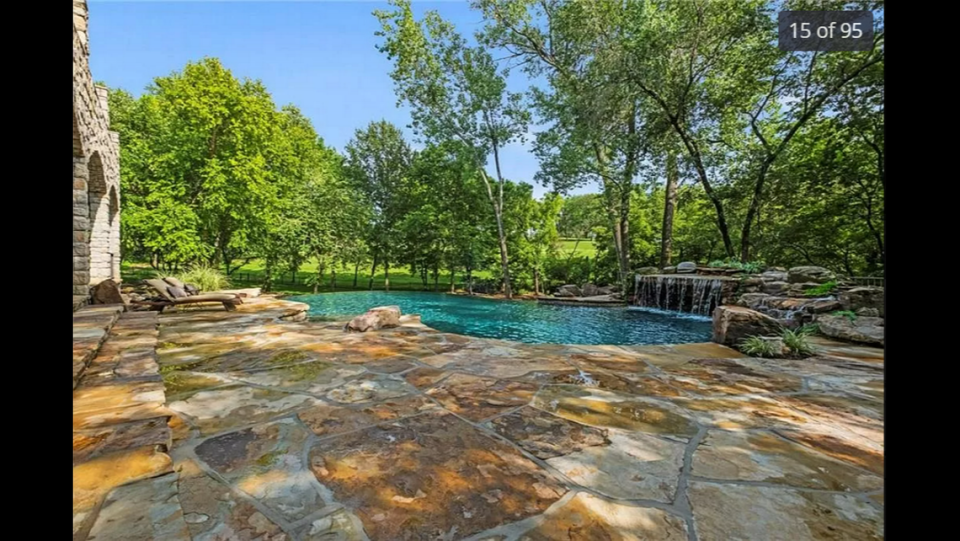 The pool at 425 NE St. Andrews Circle in Lee’s Summit is heated and filled with salt-water. The pool also has a resort-style waterfall.