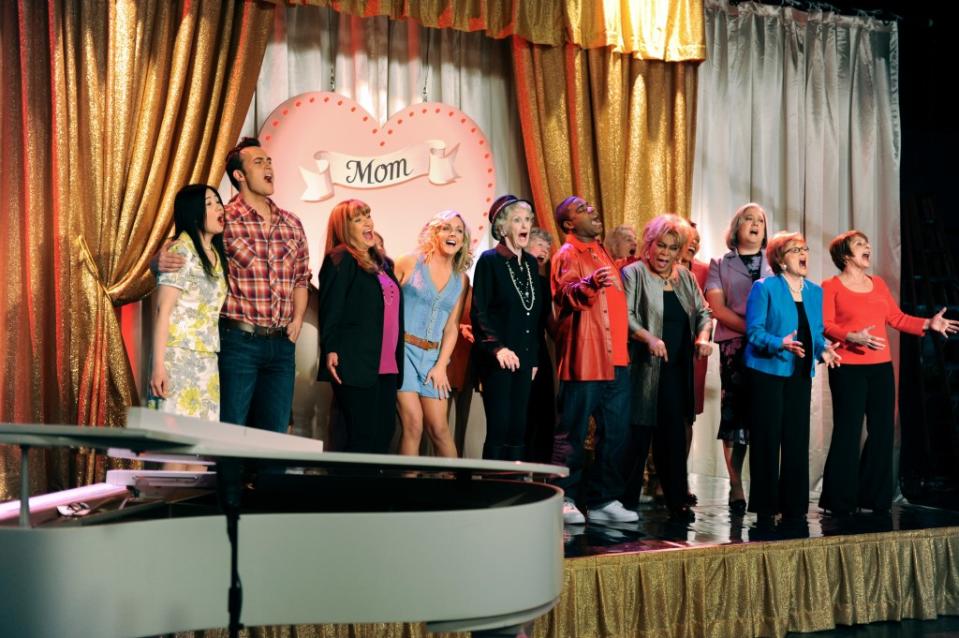 Kyoko Bruguera (from left) as Miho, Cheyenne Jackson as Danny, Jan Hooks as Verna, Jane Krakowski as Jenna, Elaine Stritch as Colleen, Morgan as Tracy Jordan, Nelson, John Lutz as Lutz’s mom, Anita Gillette as Margaret and Patti LuPone as Sylvia in “30 Rock.” NBCUniversal via Getty Images