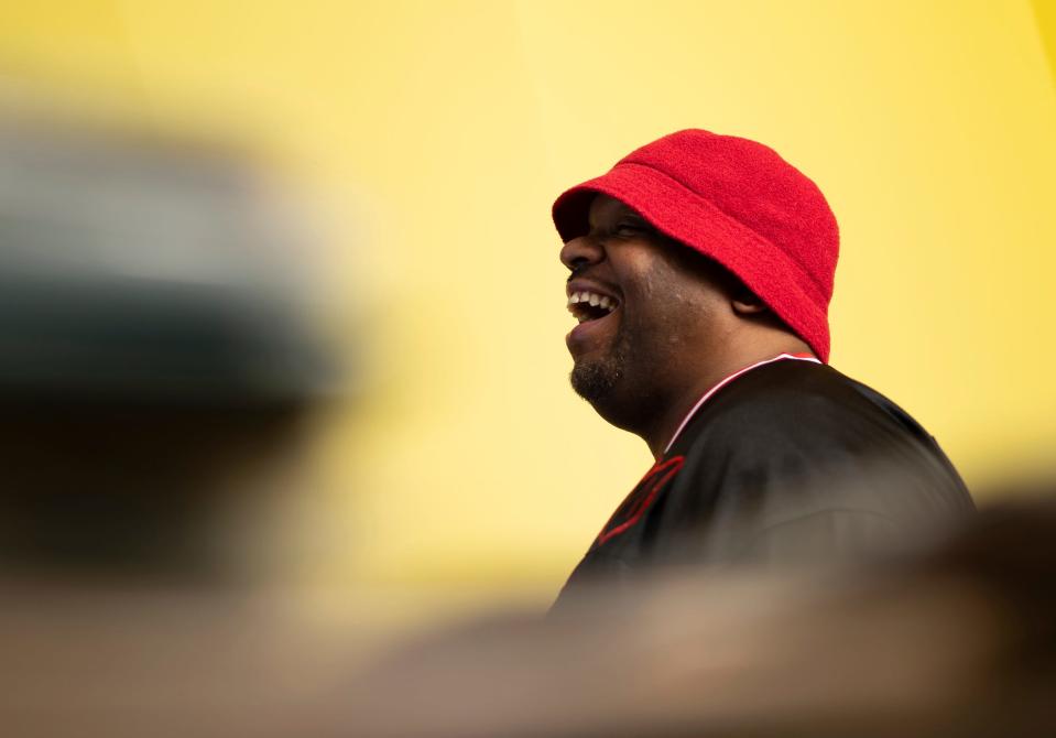Slum Village member T3 listens through a collection of records in search of samples to use with group member Young RJ for their next album at a home recording studio in Milford on Thursday, May 9, 2024.