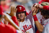 Philadelphia Phillies' Luke Williams celebrates his run with teammates during the fourth inning of a baseball game against the Atlanta Braves, Friday, July 23, 2021, in Philadelphia. (AP Photo/Chris Szagola)