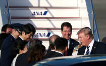 U.S. President Donald Trump and first lady Melania Trump arrive at Tokyo Haneda Airport in Tokyo, Japan May 25, 2019. REUTERS/Athit Perawongmetha