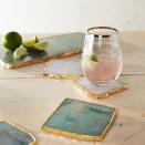 <p>We found coasters that are sure to keep your coffee table chic all year round.</p><p>Buy it <a rel="nofollow noopener" href="https://click.linksynergy.com/fs-bin/click?id=93xLBvPhAeE&subid=0&offerid=493746.1&type=10&tmpid=16681&RD_PARM1=https%3A%2F%2Fwww.anthropologie.com%2Fshop%2Fgeode-coaster&u1=IS%2CHOL%2CGAL%2CNailtheSecretSantaExchangewithTheseGiftsUnder%2425%2Cldolak1271%2C201712%2CT" target="_blank" data-ylk="slk:here;elm:context_link;itc:0;sec:content-canvas" class="link ">here</a> for $14.</p>