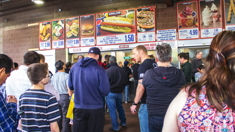 Customers in line at the Costco food court