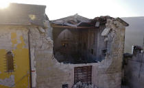 <p>Aerial view of the church of Santa Maria della Misericordia in Accumoli in central Italy, Aug. 26, 2016, where a strong quake hit early Wednesday. Strong aftershocks rattled residents and rescue crews alike Friday as hopes began to dim that firefighters would find any more survivors as donations began pouring into the area and Italy again anguished over its failure to protect ancient towns and modern cities from the country’s highly seismic terrain. (AP Photo/Localteam) </p>