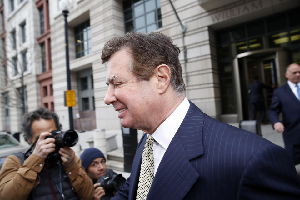 FILE- In this April 19, 2018, file photo Paul Manafort departs Federal District Court after a hearing in Washington. Prosecutors in New York City are building a potential criminal case against Manafort, as he awaits sentencing on federal conspiracy and fraud convictions, according to reports published Friday, Feb. 22, 2019. (AP Photo/Alex Brandon, File)