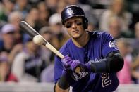 Colorado Rockies' Troy Tulowitzki (2) watches ball one go by during the sixth inning of a baseball game against the Chicago White Sox, Tuesday, April 8, 2014, in Denver. (AP Photo/Barry Gutierrez)