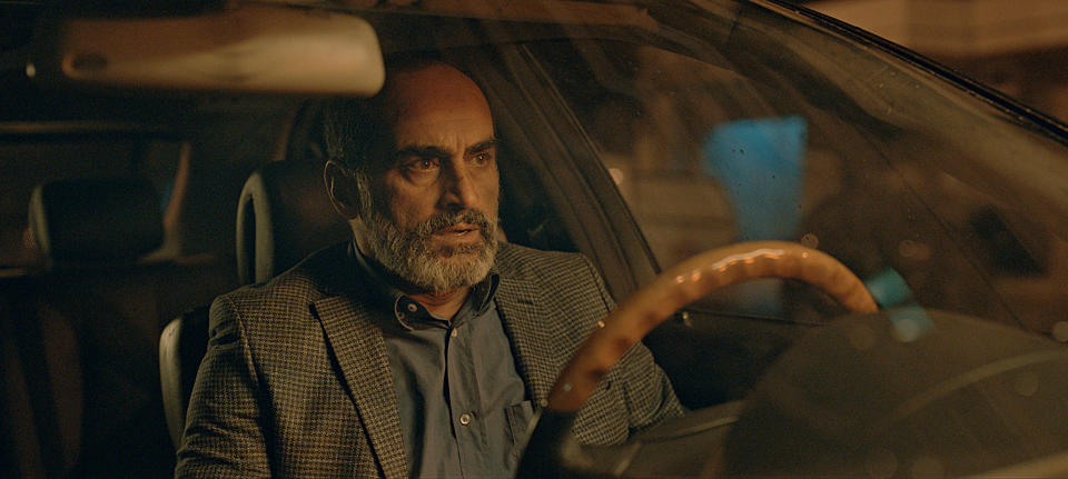 This image released by Apple TV+ shows Navid Negahban as Masoud Tabrizi in a scene from "Tehran." (Apple TV+ via AP)