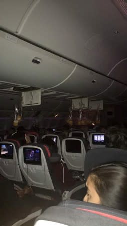 Oxygen masks fall during turbulence in the Air Canada AC 33 flight