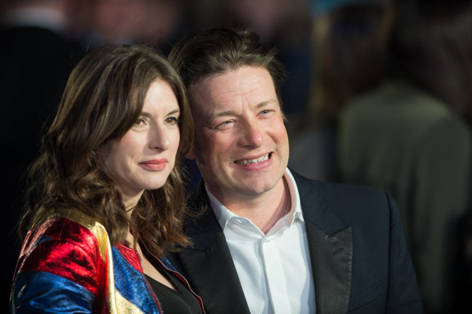 Jools and Jamie Oliver pose on the red carpet