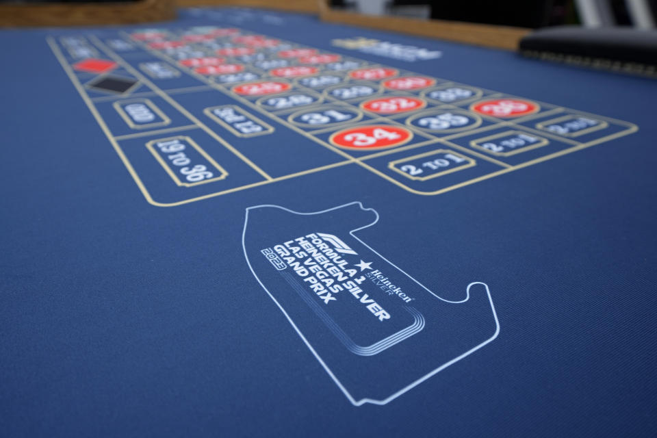 A sign for the Formula One Las Vegas Grand Prix adorns a roulette table near the paddock ahead of the race, Wednesday, Nov. 15, 2023, in Las Vegas. (AP Photo/Darron Cummings)