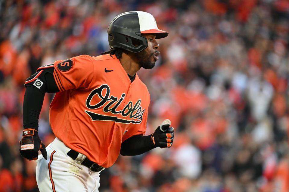 Baltimore Orioles center fielder Cedric Mullins (31) runs out a single during game two of the ALDS for the 2023 MLB playoffs against the Texas Rangers at Oriole Park at Camden Yards.