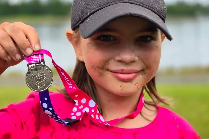 Kara McInally with her medal. -Credit:WSH]