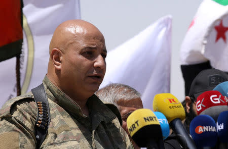 FILE PHOTO: Then Syrian Democratic Forces (SDF) spokesman Talal Silo speaks during a press conference in Hukoumiya village in Raqqa, Syria June 6, 2017. REUTERS/Rodi Said/File Photo