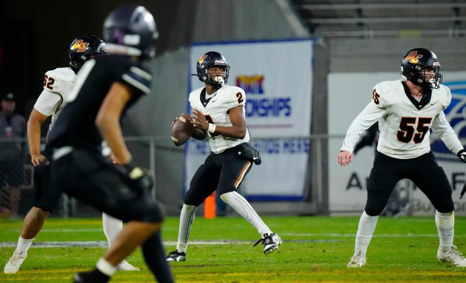 Desert Edge quarterback Hezekiah Millender throws a pass against Higley during the 5A State Championship at Mountain America Stadium in Tempe on Dec. 1, 2023.