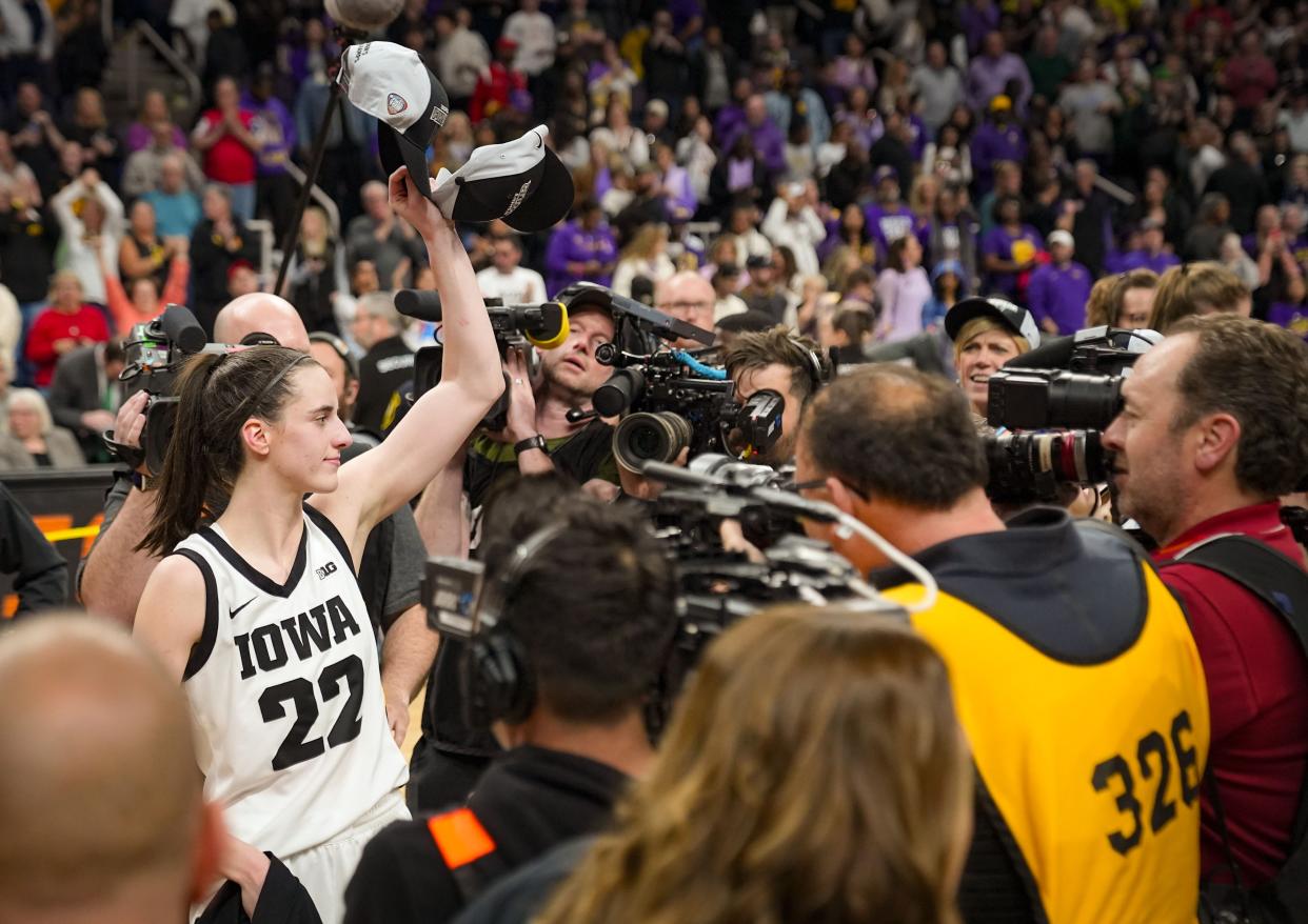Iowa guard Caitlin Clark celebrates after beating LSU in the Elite Eight on Monday.