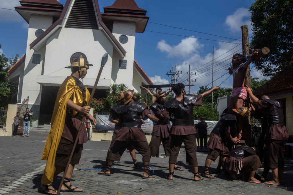 Christians reenact the crucifixion of Jesus in Surabaya, East Java. (Suryanto Putramudji / NurPhoto via Getty Images)