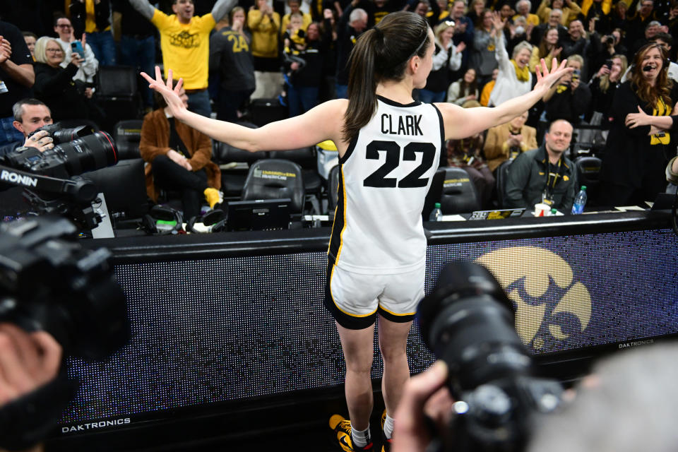 Iowa guard Caitlin Clark celebrates after her buzzer-beating shot to beat Indiana on Feb. 26, 2023, at Carver-Hawkeye Arena in Iowa City, Iowa. (Keith Gillett/Icon Sportswire via Getty Images)