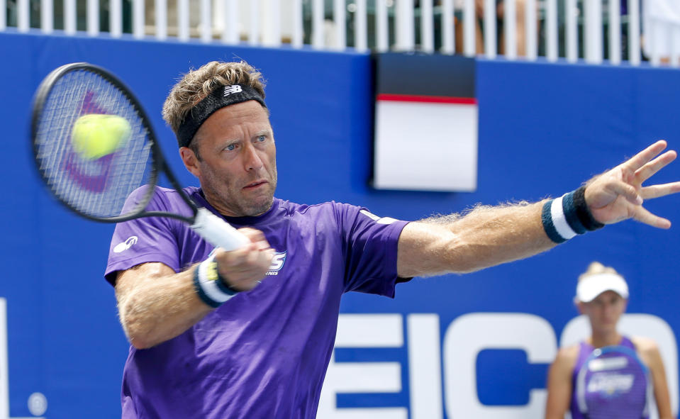 Springfield Laser tennis player Robert Lindstedt returns a serve during the World TeamTennis tournament at The Greenbrier resort Sunday, July 12, 2020, in White Sulphur Springs, W.Va. (AP Photo/Steve Helber)