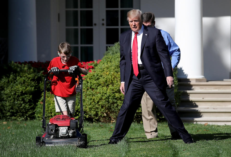 <p>President Donald Trump (R) watches as 11-year-old Frank “FX” Giaccio (L) mows the grass in the Rose Garden of the White House September 15, 2017 in Washington, DC. Giaccio, from Falls Church, Virginia, who runs a business called FX Mowing, wrote a letter to Trump expressing admiration for Trump’s business background and offered to mow the White House grass. (Photo: Win McNamee/Getty Images) </p>