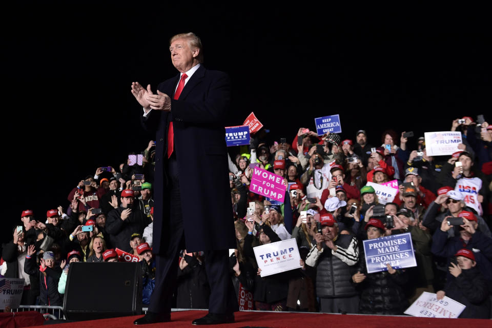 President Donald Trump arrives to speak at a rally at Central Wisconsin Airport in Mosinee, Wis., Wednesday, Oct. 24, 2018. (AP Photo/Susan Walsh)