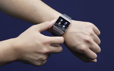 A fitbit smart device - Credit: Bloomberg