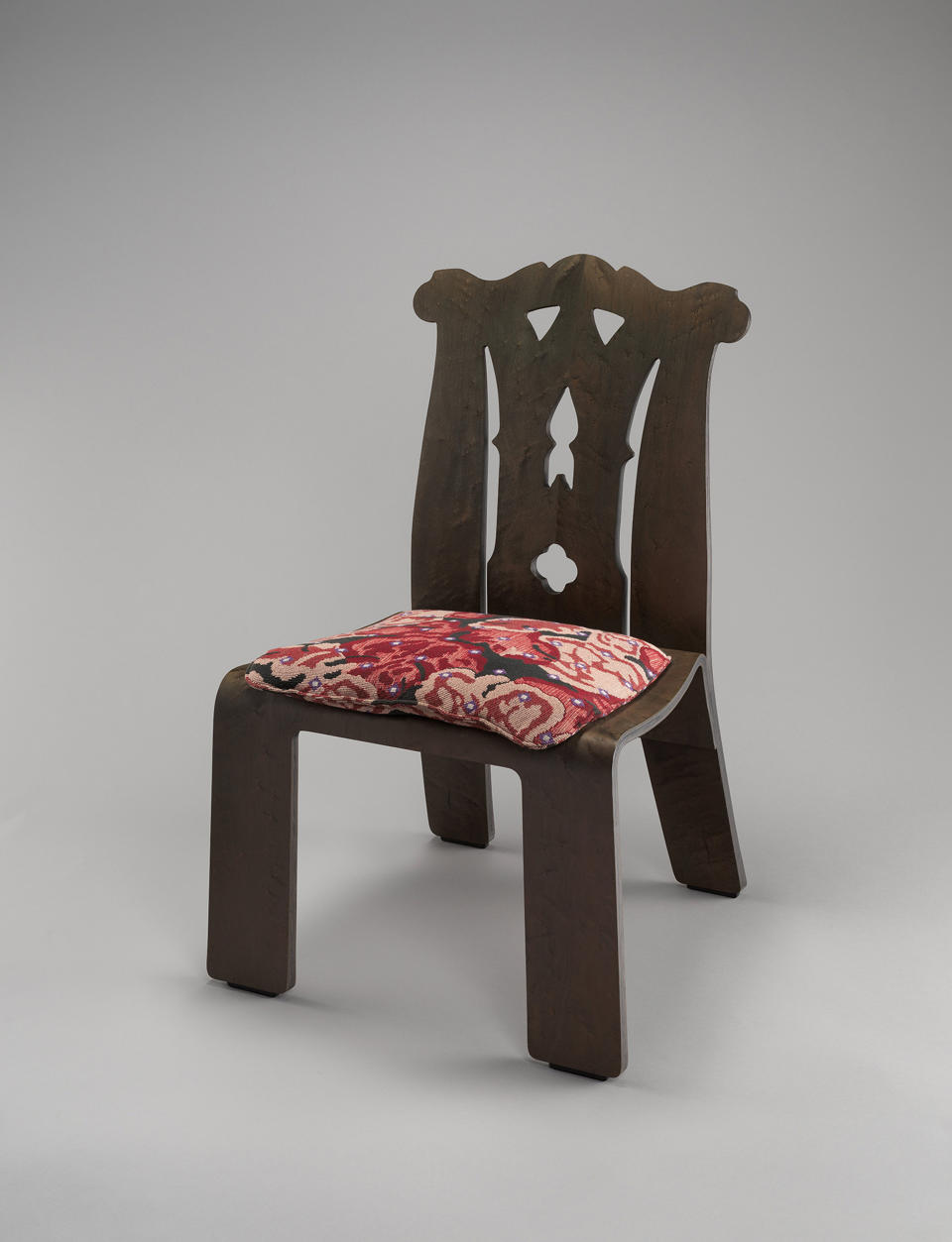 This photo provided by The Metropolitan Museum of Art shows a "Chippendale" Chair with "Tapestry" pattern upholstery which was Designed by Robert Venturi and Denise-Scott Brown in Philadelphia and is featured in the exhibit "Chippendale's Director: The Designs and Legacy of a Furniture Maker," which runs through Jan. 27, 2019, at the museum in New York. (The Metropolitan Museum of Art via AP)