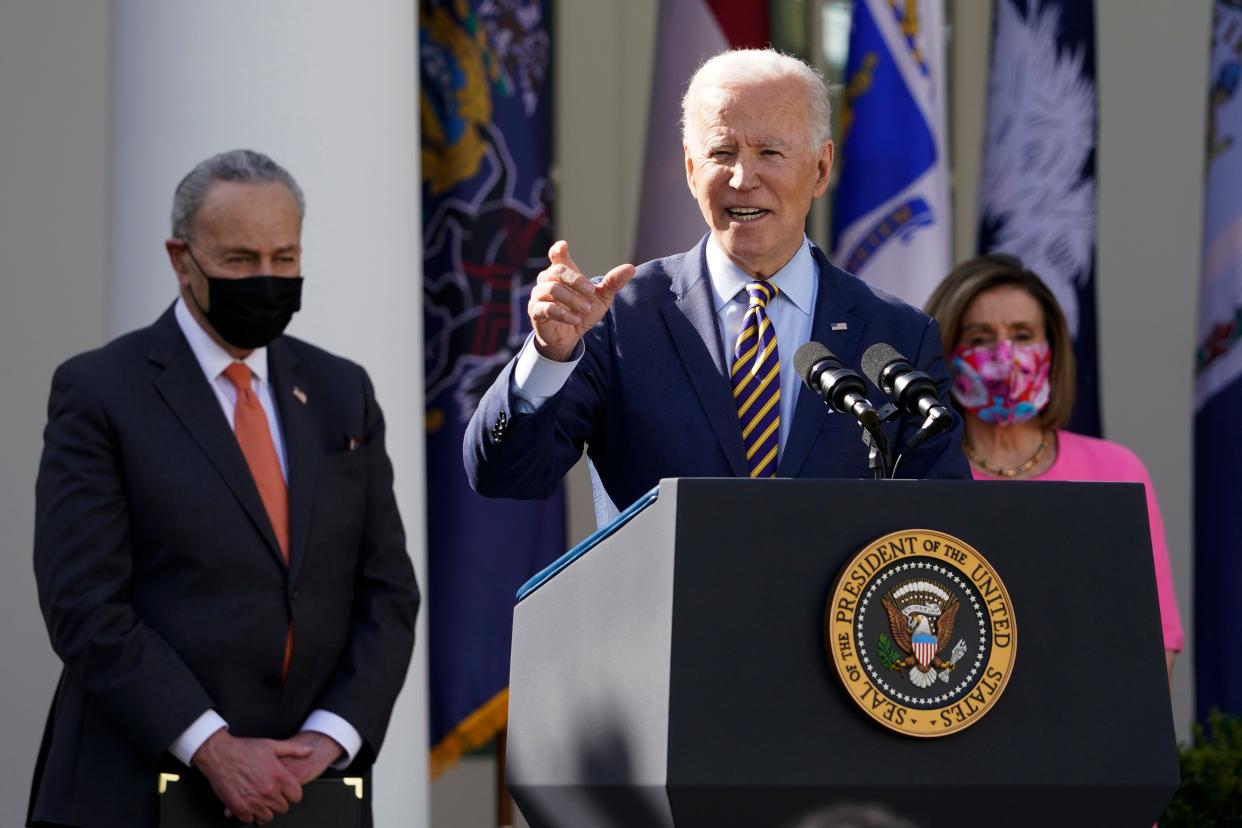 President Joe Biden at the White House with Senate Majority Leader Chuck Schumer and House Speaker Nancy Pelosi on March 12, 2021, in Washington.