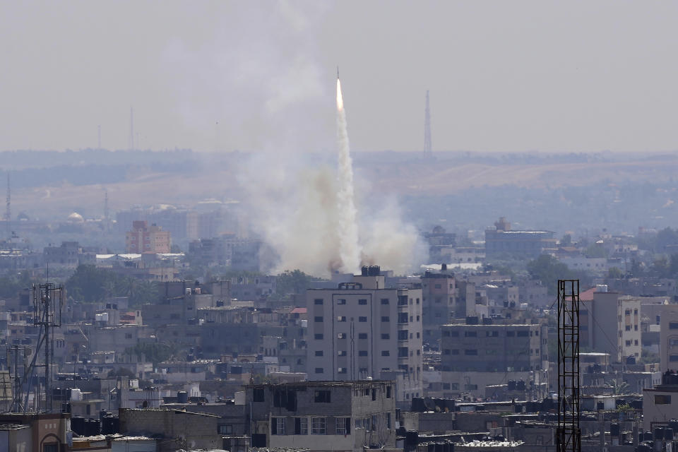 Rockets are launched from the Gaza Strip towards Israel, in Gaza City, Wednesday, May 10, 2023. Israeli aircraft struck targets in the Gaza Strip for a second straight day on Wednesday, killing at least one Palestinian and pushing the region closer toward a new round of heavy fighting. (AP Photo/Adel Hana)