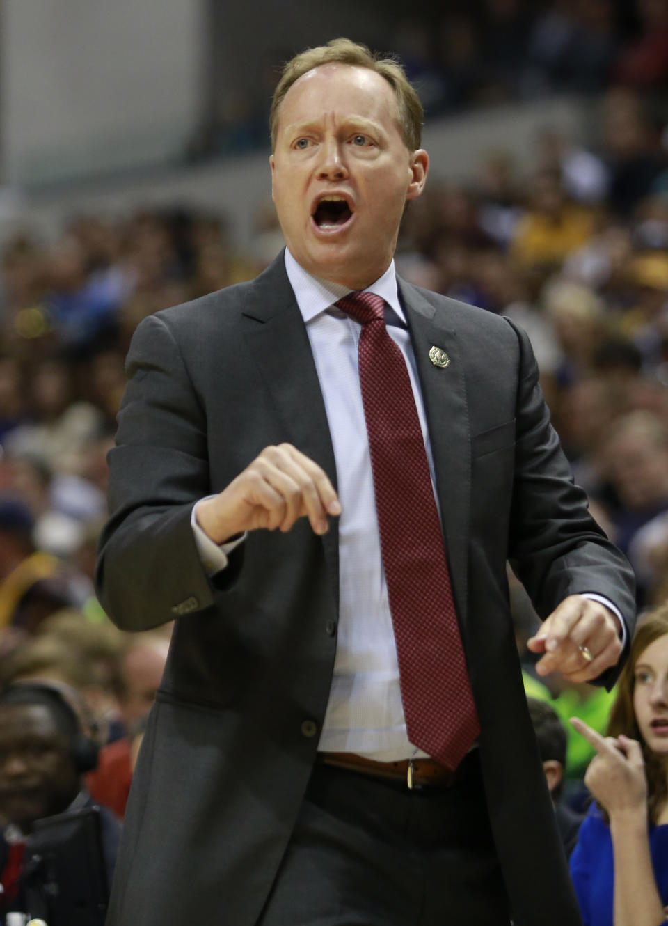 Atlanta Hawks head coach Mike Budenholzer reacts to an official's call in the first half of an NBA basketball game against the Indiana Pacers in Indianapolis, Sunday, April 6, 2014. Atlanta won 107-88. (AP Photo/R Brent Smith)