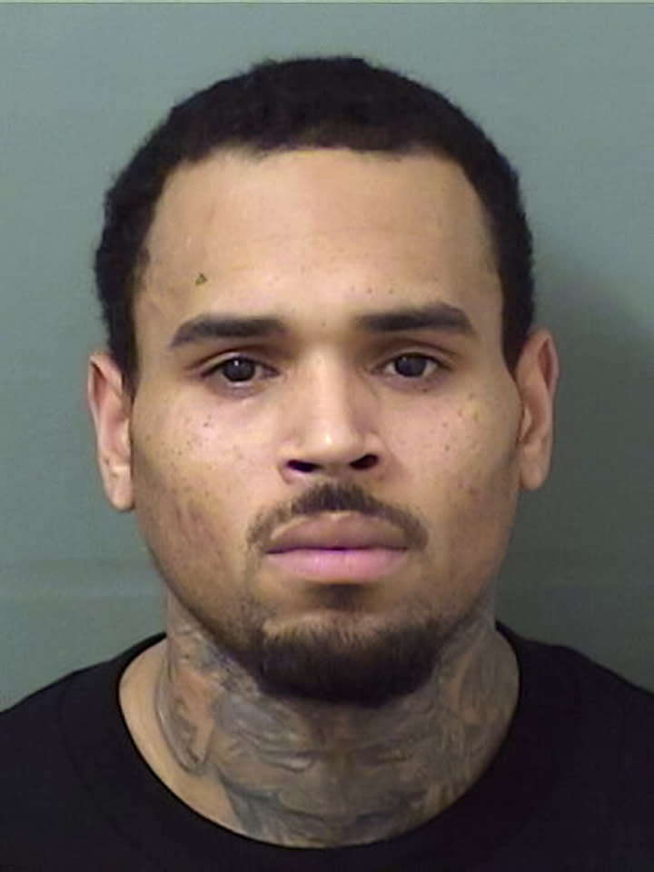 WEST PALM BEACH, FL - JULY 05:  In this handout photo provided by the Palm Beach County Sheriff's Office, rapper Chris Brown is seen in a police booking photo after his arrest on charges felony battery on July 5, 2018 in West Palm Beach, Florida. The charges stem from an outstanding warrant when he allegedly attached a photographer at a nightclub last year in Tampa.  (Photo by Palm Beach County Sheriff's Office via Getty Images)