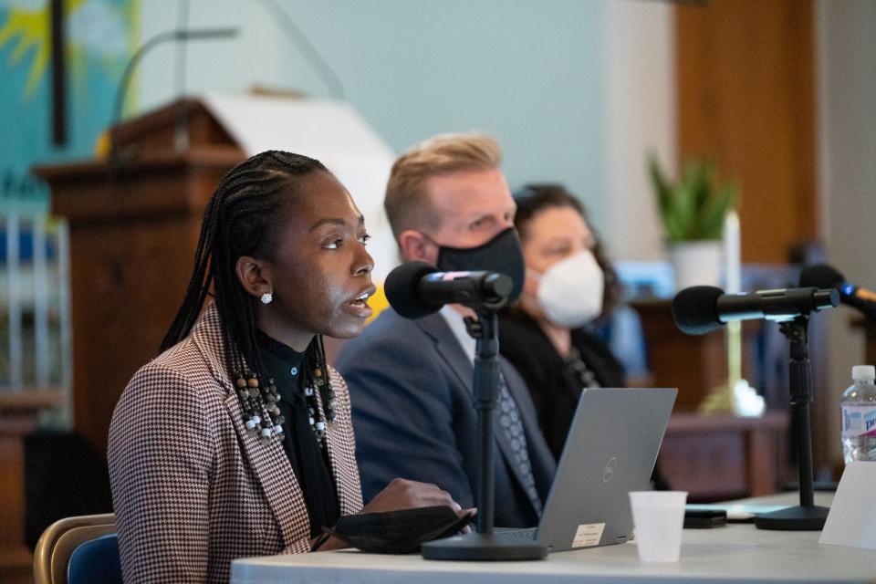 Kandyce Perry, Director of the DEP’s Office of Environmental Justice in foreground, discusses community protection efforts with DEP Commissioner Shawn M. LaTourette (center) and Lisa Garcia of the U.S. Environmental Protection Agency (right).