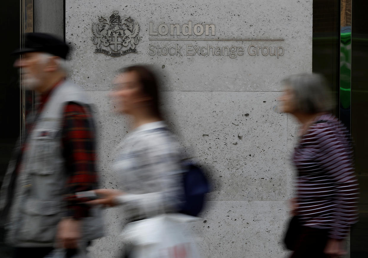 LSE People walk past the entrance of the London Stock Exchange in London, Britain. Aug 23, 2018. REUTERS/Peter Nicholls