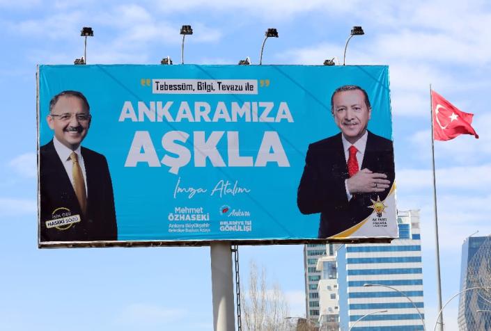AKP candidate Mehmet Ozhaseki (L) faces a challenge in the race for mayor of the Turkish capital (AFP Photo/Adem ALTAN)
