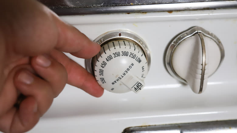 Hand turning oven dial