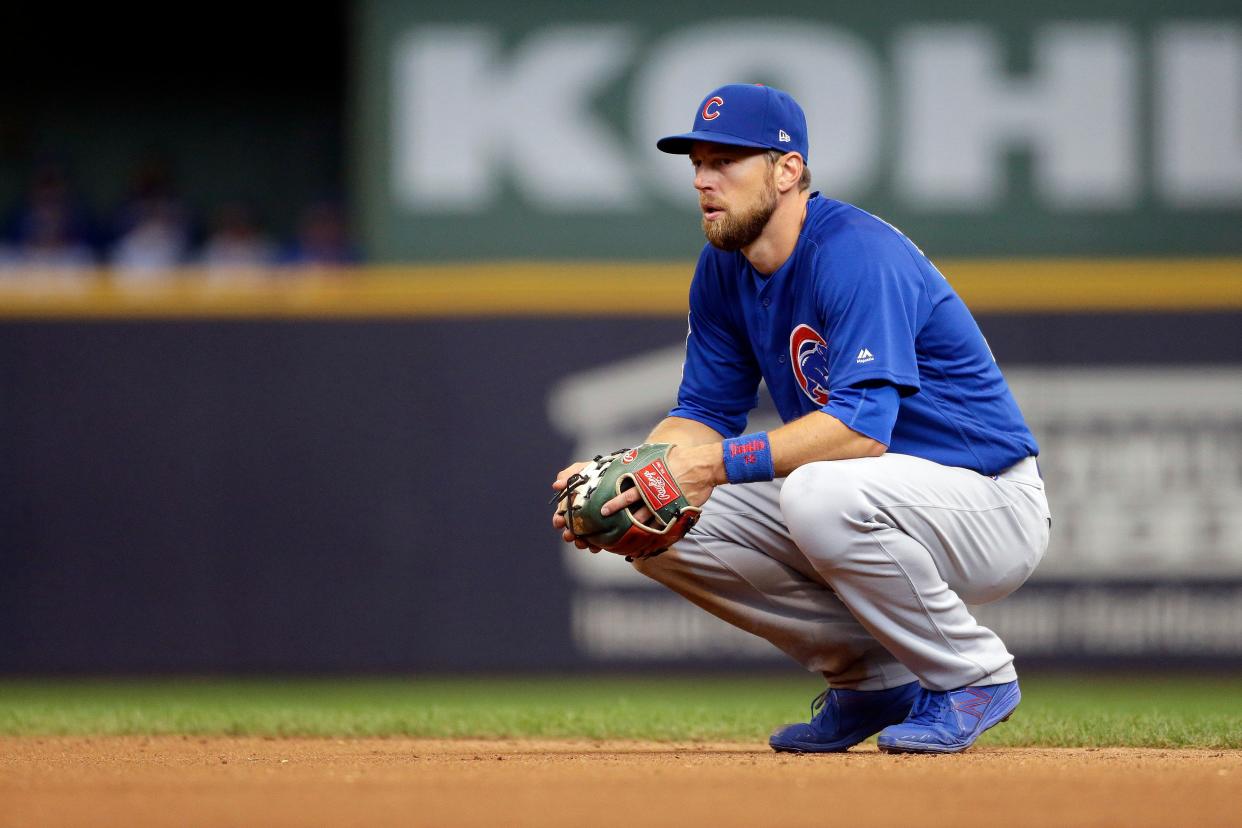 The Chicago Cubs' Ben Zobrist takes the field in the eighth inning of a baseball game against the Brewers on Sept. 8, 2019, in Milwaukee.