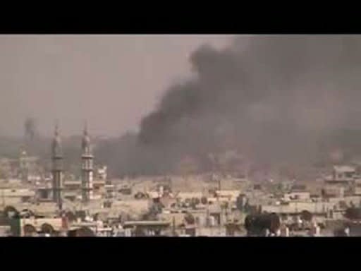 An image grab taken from a video uploaded on YouTube allegedly shows shelling by government forces of the Rifai and Karm al-Zeitun neighbourhoods in the flashpoint central Syrian city of Homs. AFP is using pictures from alternative sources as it was not authorised to cover this event