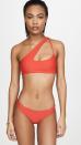 Like a halter, but not quite. Mikoh's asymmetric bikini top is guaranteed to get you <em>all</em> the heart eye emojis—and we love the contrast between the thick and thin straps in the front. $117, Shopbop. <a href="https://www.shopbop.com/queensland-bikini-top-mikoh/vp/v=1/1549380093.htm?" rel="nofollow noopener" target="_blank" data-ylk="slk:Get it now!;elm:context_link;itc:0;sec:content-canvas" class="link ">Get it now!</a>