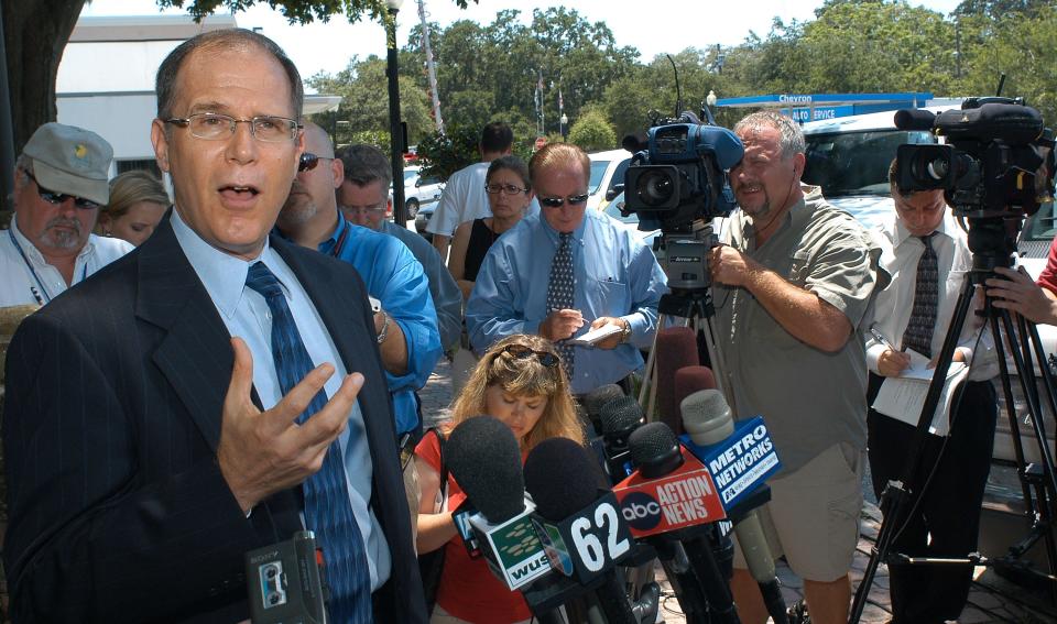 In this file photo, George Felos, then the attorney for Michael Schiavo, Terri Schiavo's husband, talks to the media after hearing the results of her autopsy report June 15, 2005 in Dunedin, Florida.