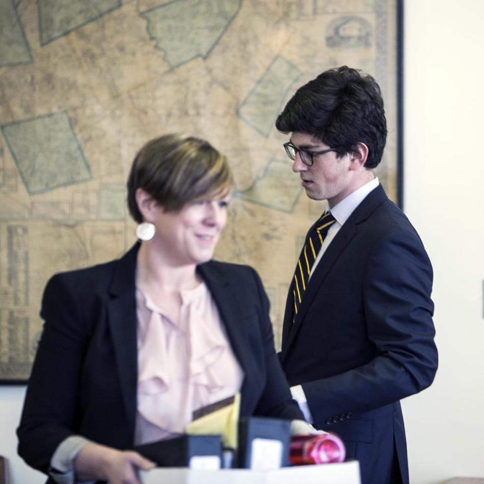 Owen Labrie enters the Merrimack County Superior court with his attorney Robin Melone during the first day of a hearing on whether he deserves a new trial, on Tuesday, Feb. 21, 2017 in Concord, N.H. Labrie claims his trial lawyers failed to challenge the felony charge. He was acquitted in 2015 of raping a 15-year-old classmate as part of a game of sexual conquest at St. Paul's School but was convicted of a felony computer charge requiring him to register as a sex offender. (Geoff Forester /The Concord Monitor via AP, Pool)