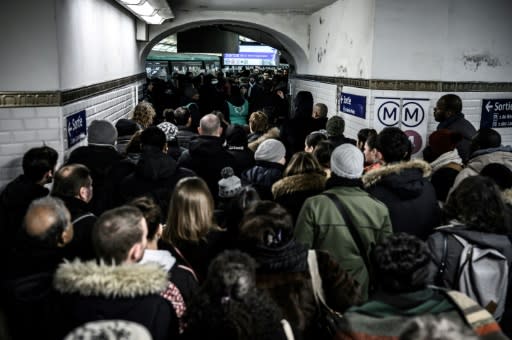 Commuters on the Paris metro faced another day of travel havoc Thursday as unions pressed their strike against a planned pension reform