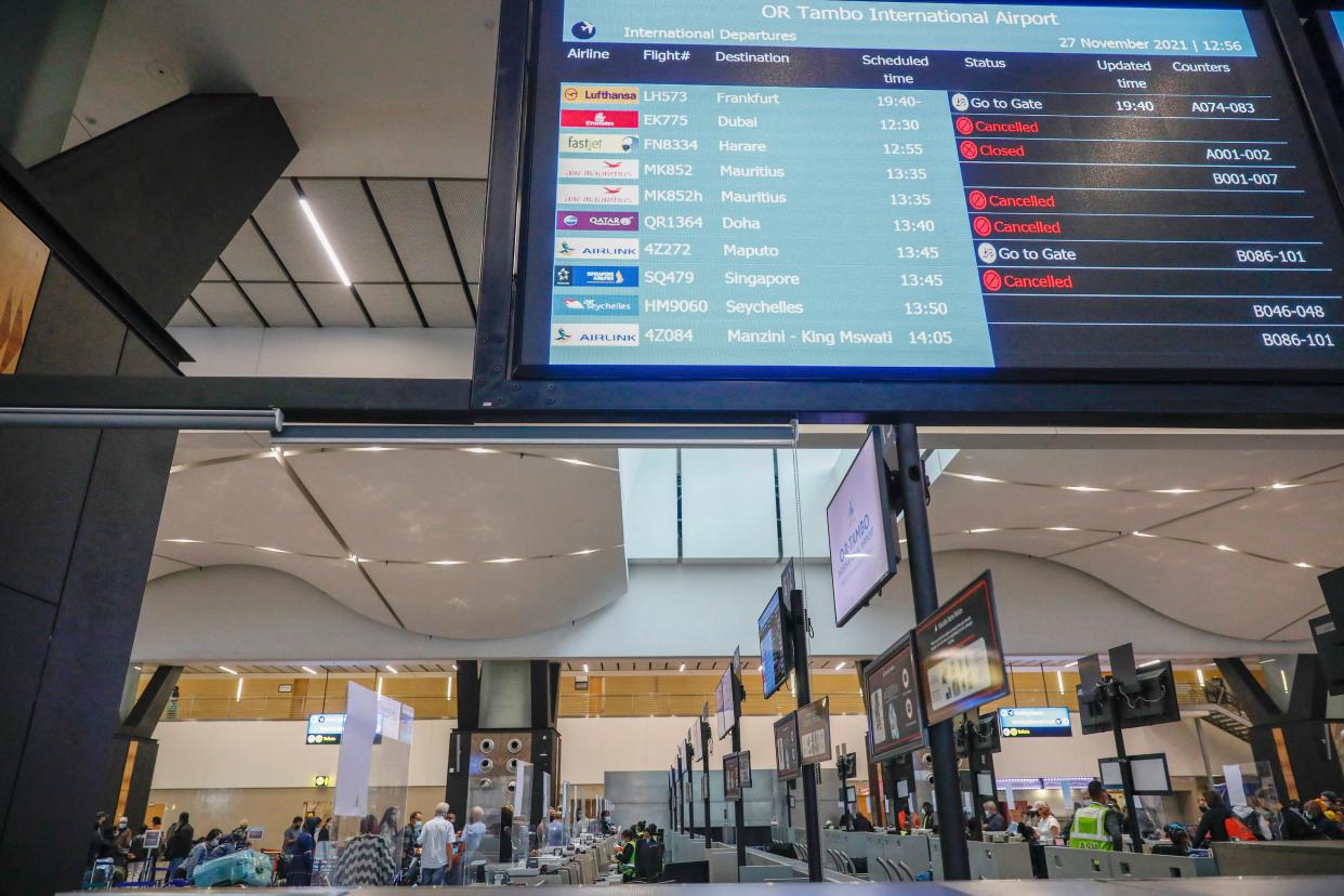 An electronic flight notice board lists some canceled flights at O.R. Tambo International Airport in Johannesburg, South Africa.