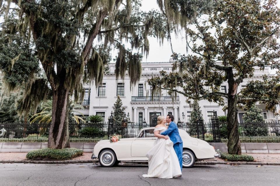 The Hills, newlywed, standing with "Kandice," fully restored 1956 Bentley S1