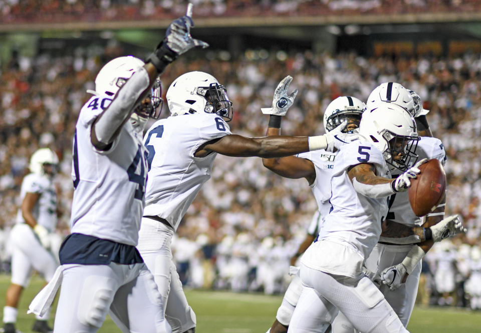 COLLEGE PARK, MD - SEPTEMBER 27:  Penn State Nittany Lions cornerback Tariq Castro-Fields (5) is congratulated after intercepting a pass in the end zone in the second quarter against the Maryland Terrapins on September 27, 2019, at Capital One Field at Maryland Stadium in College Park, MD.  Photo by Mark Goldman/Icon Sportswire via Getty Images)