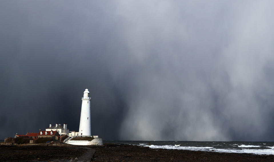 A snow storm over St Mary’s Lighthouse in Whitley Bay, as heavy snowfall hit the UK last winter. (PA)